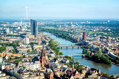 High angle view of city at riverbank