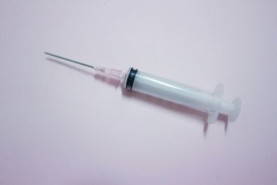 High angle view of pen on table against white background