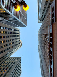Low angle view of buildings against clear sky