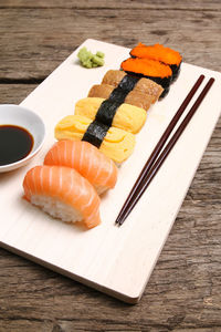 Close-up of sushi served on table