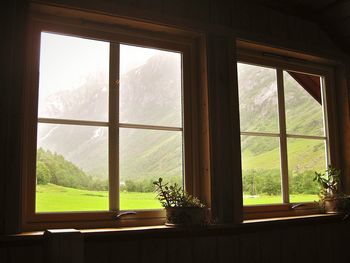 View of landscape seen through window