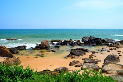 View of calm blue sea against clear sky