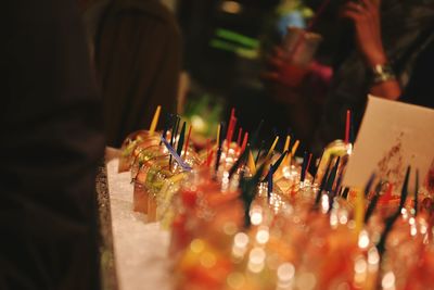 Close-up of candles on table