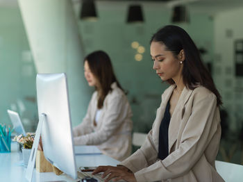 Businesswomen working in office