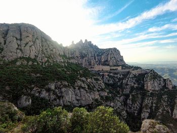 Scenic view of rocky mountains against sky