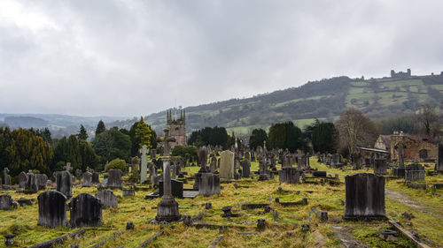 Panoramic view of cemetery against sky