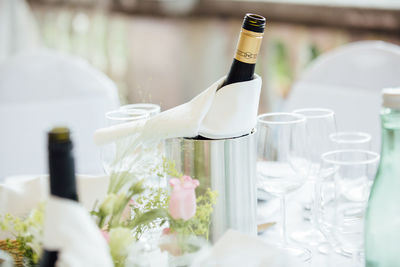 Close-up of white wine bottles