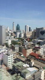 Cityscape against blue sky