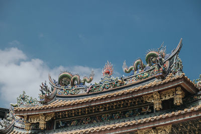 Low angle view of temple against sky