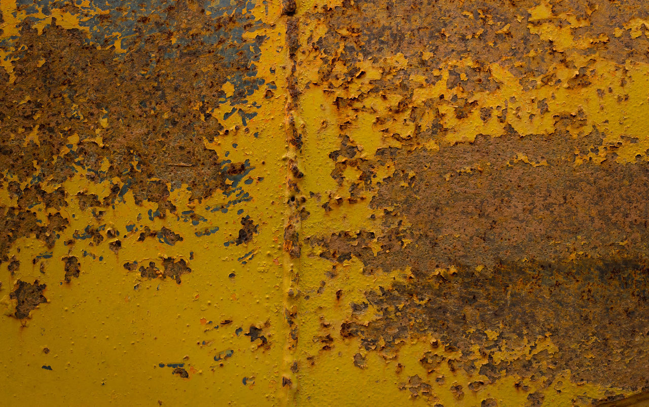FULL FRAME SHOT OF OLD YELLOW WALL