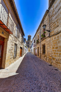 Narrow alley along buildings