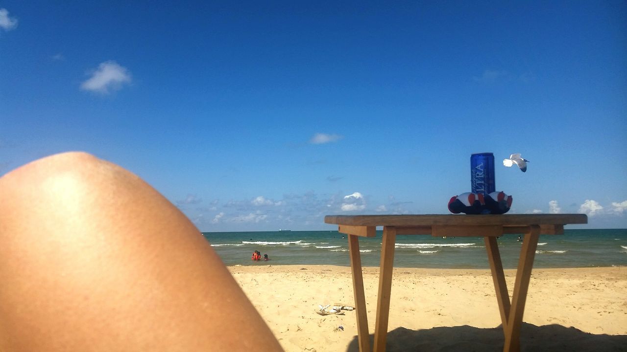 beach, sea, horizon over water, sand, shore, water, vacations, sky, scenics, blue, leisure activity, tranquil scene, tranquility, relaxation, parasol, summer, lifestyles, nature, beauty in nature