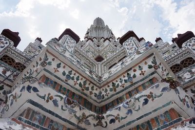 Low angle view of ornate building against sky