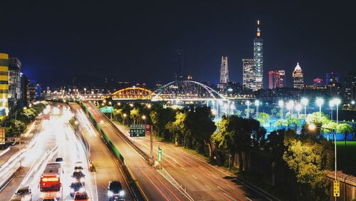 High angle view of illuminated city at night