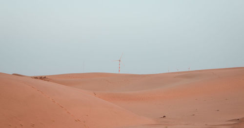 Scenic view of desert against clear sky