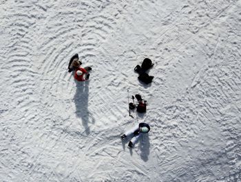 High angle view of people in snow