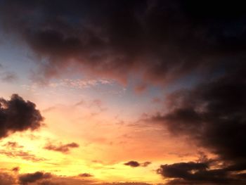 Low angle view of dramatic sky during sunset