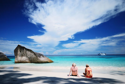 Scenic view of sea against cloudy sky