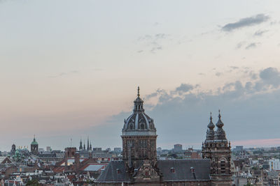 View of rooftops in amsterdam against sky