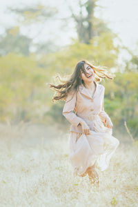 Woman wearing mask on field