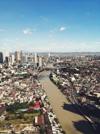 High angle view of buildings against sky in city