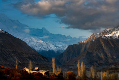 Scenic view of snowcapped mountains against sky