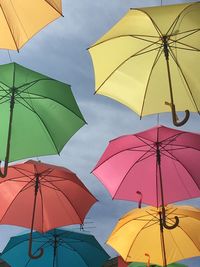 Low angle view of umbrella against sky