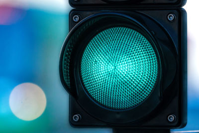 Close-up of illuminated traffic signal