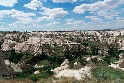 Panoramic view of landscape against cloudy sky