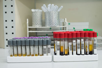 Close-up of test tubes in rack on table