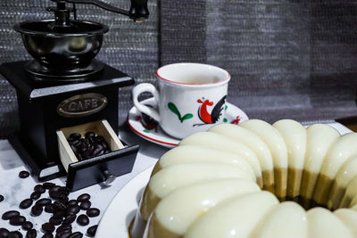 Close-up of coffee cup on table