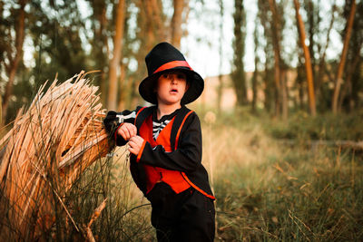 Boy wearing hat on field