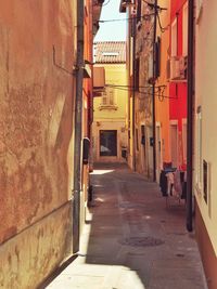 Narrow alley along buildings