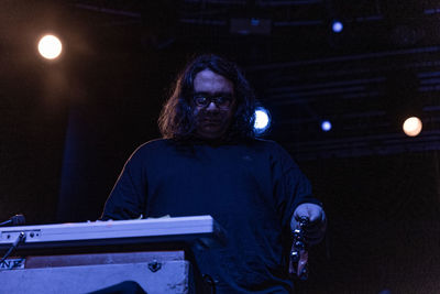 Portrait of young man in music concert