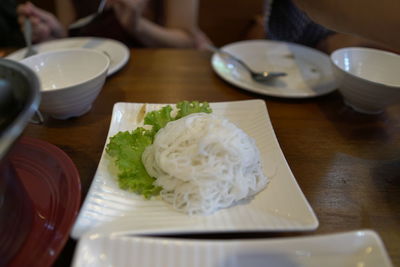 Close-up of food served on table