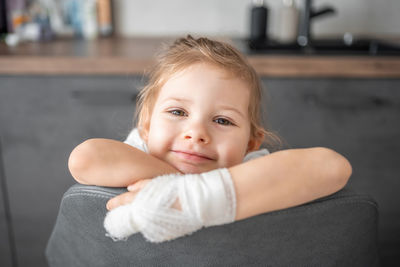 Portrait of cute baby boy at home