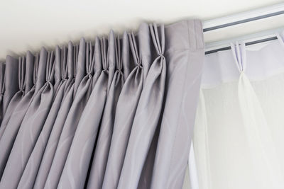 Close-up of clothes hanging on rack