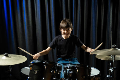 Boy playing drum