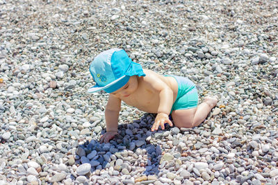 High angle view of boy on rocks