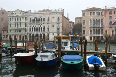 Boats moored at dock