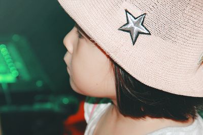 Close-up of cute girl wearing hat