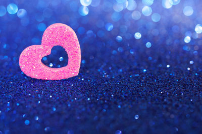 Close-up of heart shape made from pink flower