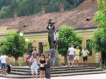 Group of people in front of building