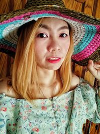 Portrait of teenage girl wearing hat