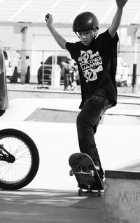 Low angle view of man skateboarding on street