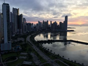 High angle view of buildings against sky during sunset