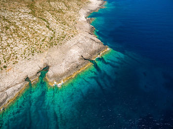 High angle view of rocks on beach