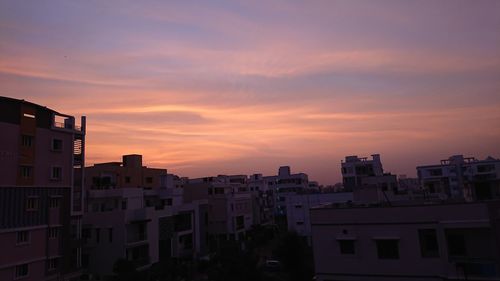 Cityscape against sky during sunset