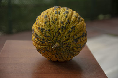 Close-up of lemon on table