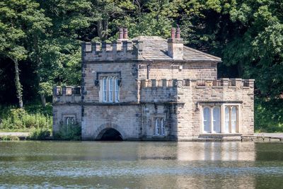 Exterior of building by lake